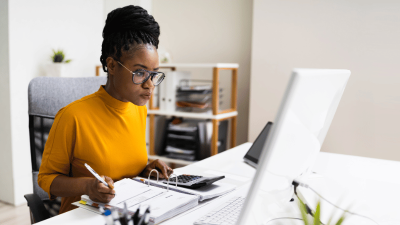 Nonprofit treasurer working at a desk