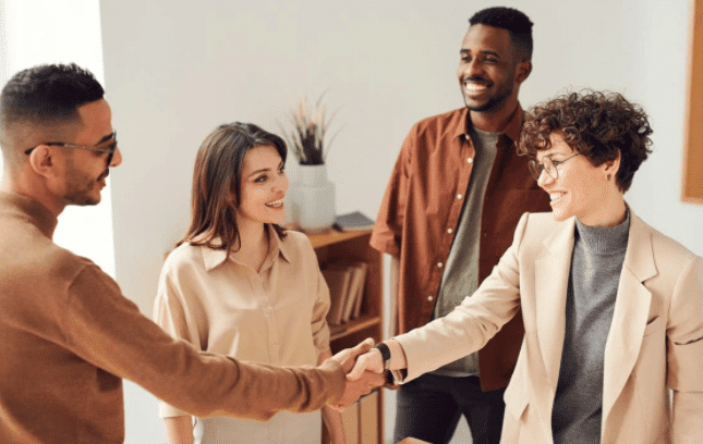 Group of donors meeting nonprofit staff.